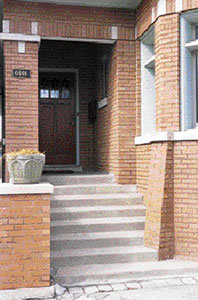 This vintage Chicago bungalow sits with three other "green" bungalows at the end of an old trolley line.